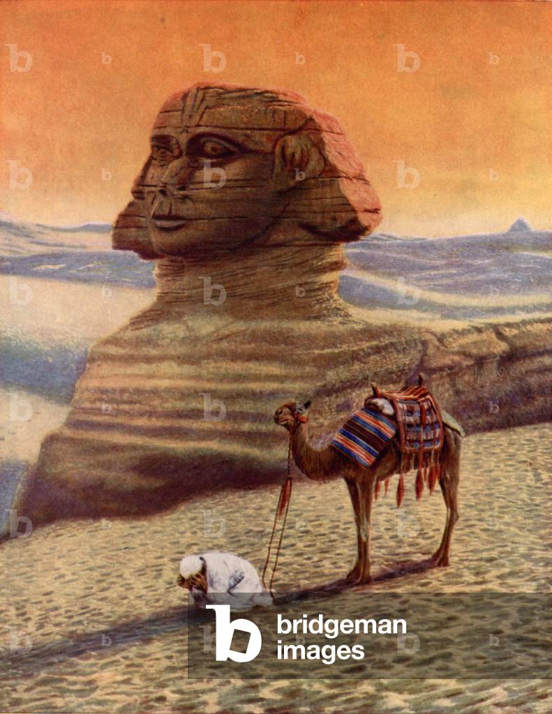 Obeying the Call to Prayer beneath the shadow of the Sphinx (colour photo)