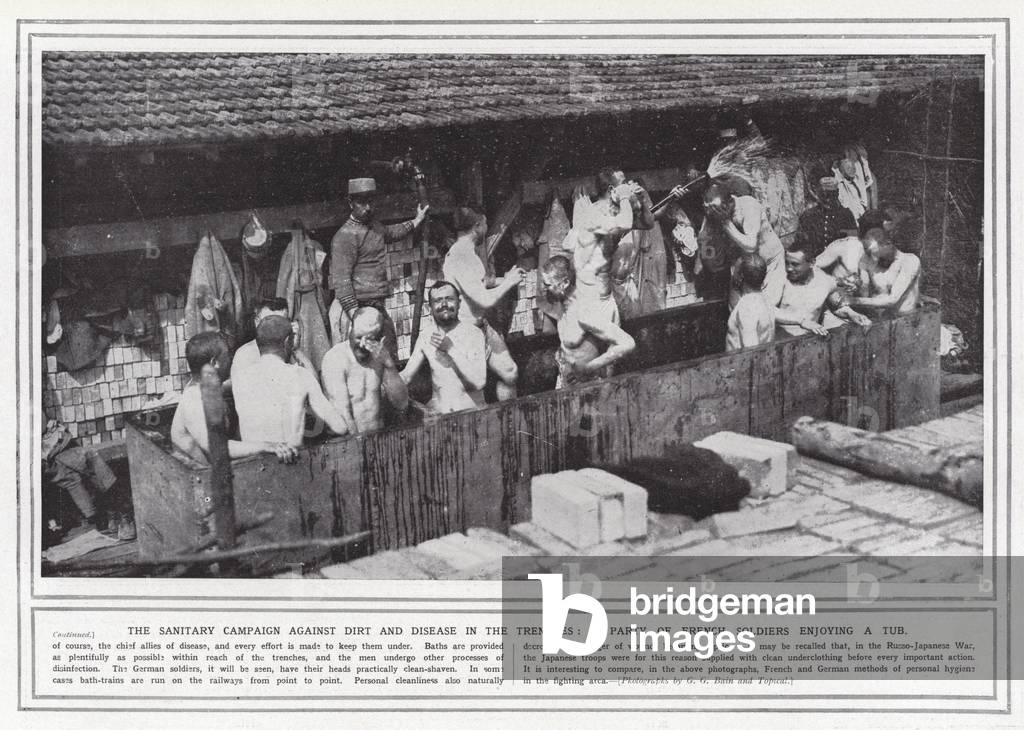 The sanitary campaign against dirt and disease in the trenches, a party of French soldiers enjoying a tub (b/w photo)