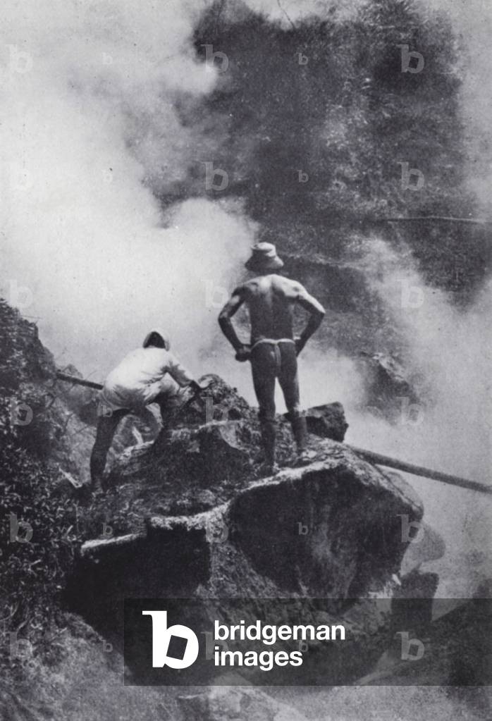 Watching an eruption of the Aso-San Volcano (b/w photo)
