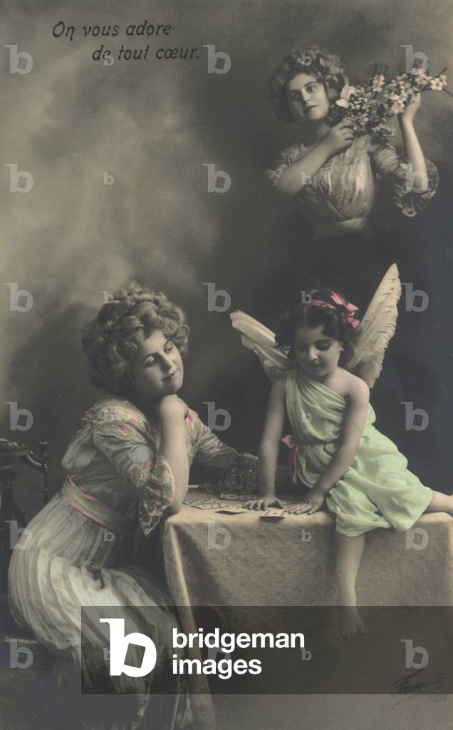 Woman with a little girl dressed as a fairy (colour photo)