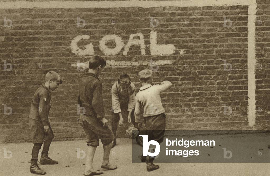 Football in the East End (b/w photo)