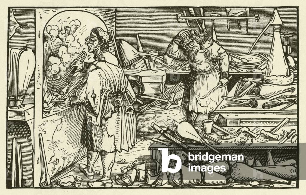 Alchemist's laboratory in the 16th Century (woodcut)