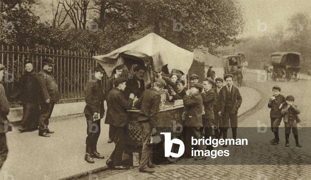 A son of Italy does a brisk trade in frozen something-or-other (b/w photo)