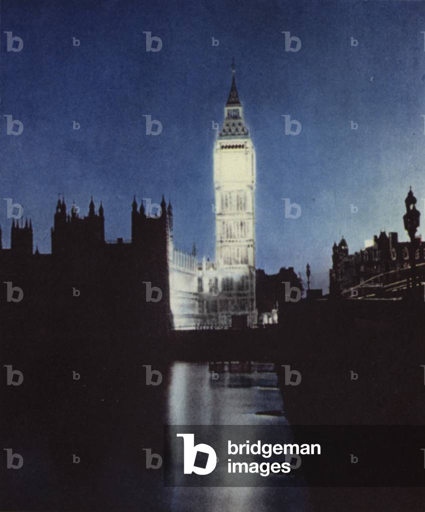 Big Ben, the clock tower of the Houses of Parliament in London floodlit on the night of VE Day, 8 May 1945, having been subject to the blackout in force during World War II (photo)