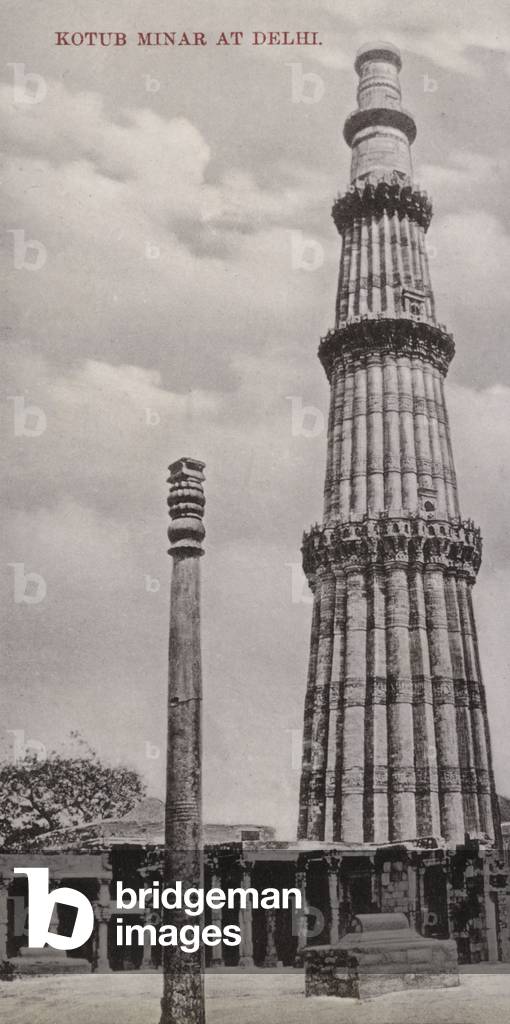 Qutb Minar and Iron Pillar of Delhi, Qutb Complex, Delhi, India (b/w photo)