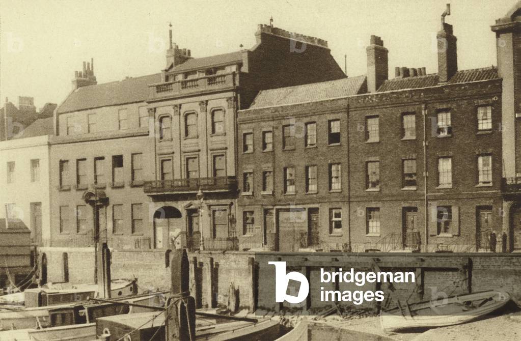 Doorways of other times that have survived the housebreakers (b/w photo)
