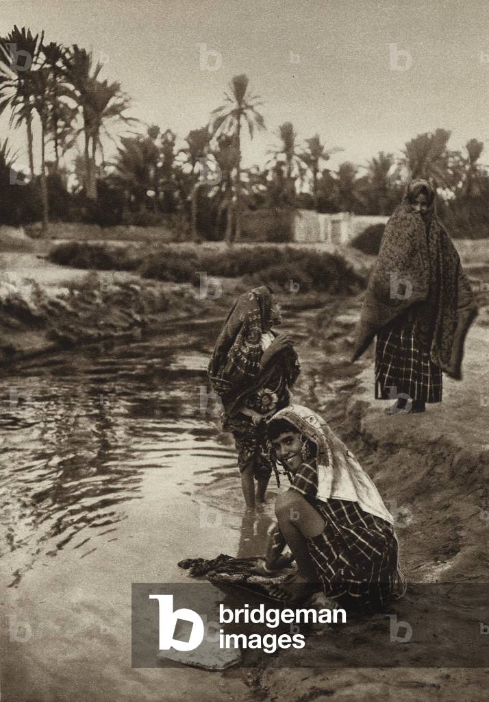 Gabes Oasis, Girl washing (b/w photo)