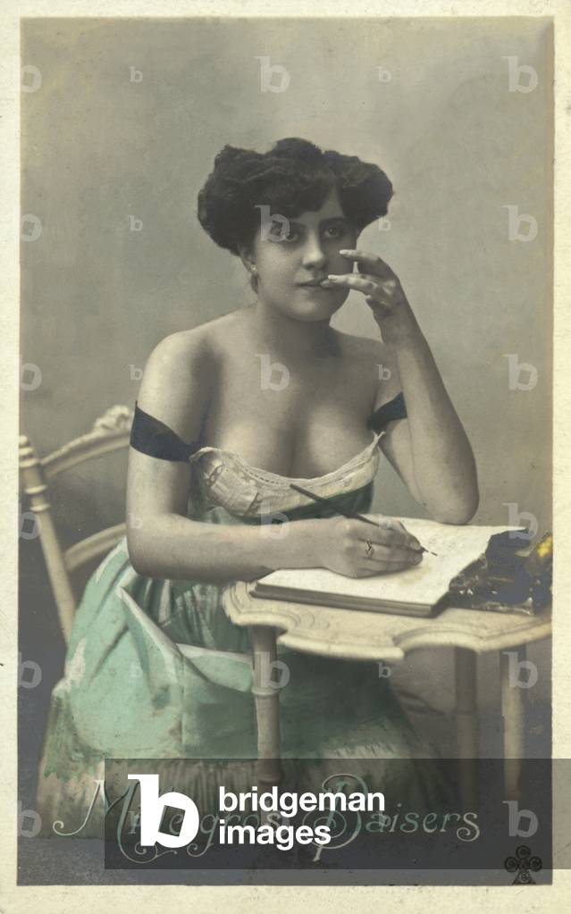 Girl writing a letter (colour photo)