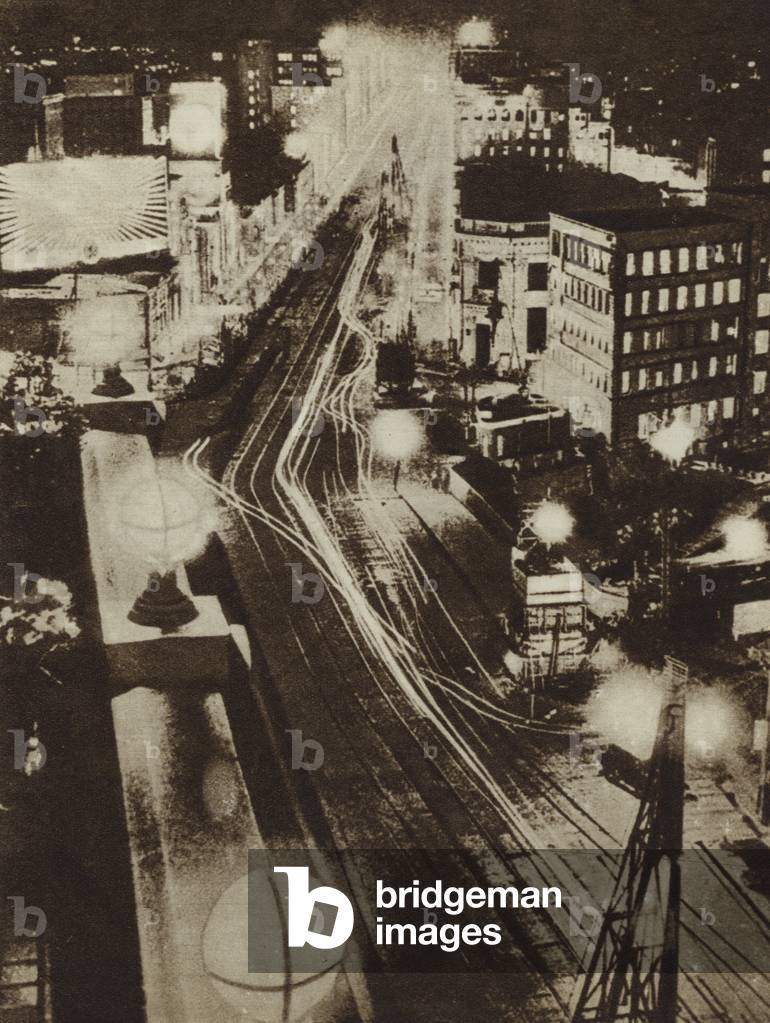 Bright lights of Ginza, Tokyo, Japan, at night (b/w photo)