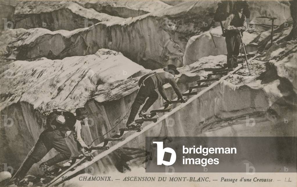 Chamonix - the ascent of Mont Blanc. Climbers passing a crevice. Postcard sent in 1913.