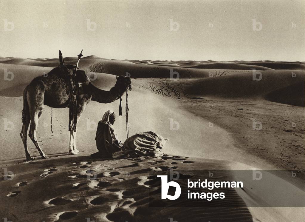Worshipping in the desert (b/w photo)