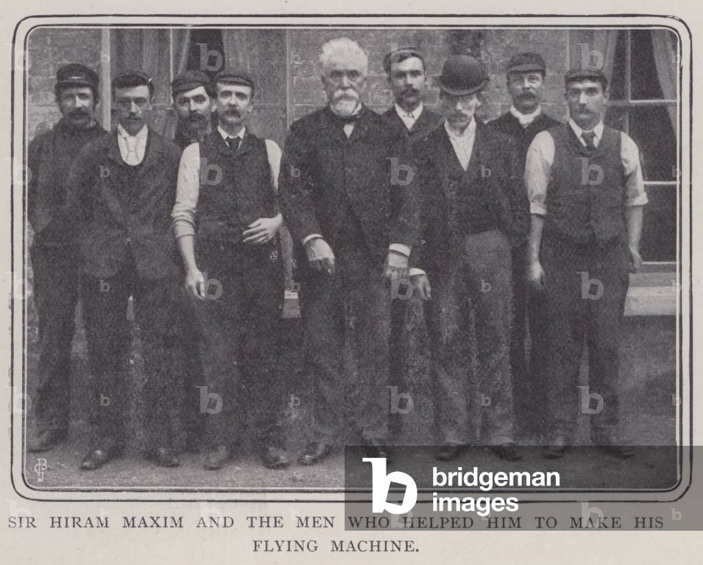 Sir Hiram Maxim and the men who helped him to make his flying machine (b/w photo)