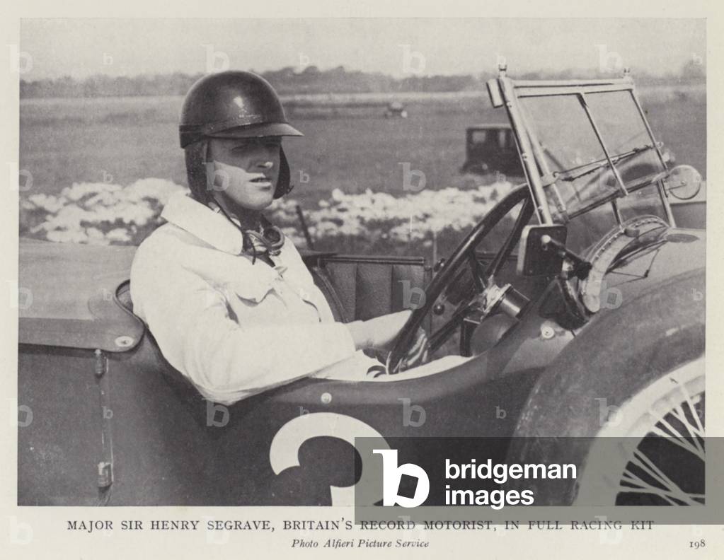 Major Sir Henry Segrave, Britain's record motorist, in full racing kit (b/w photo)