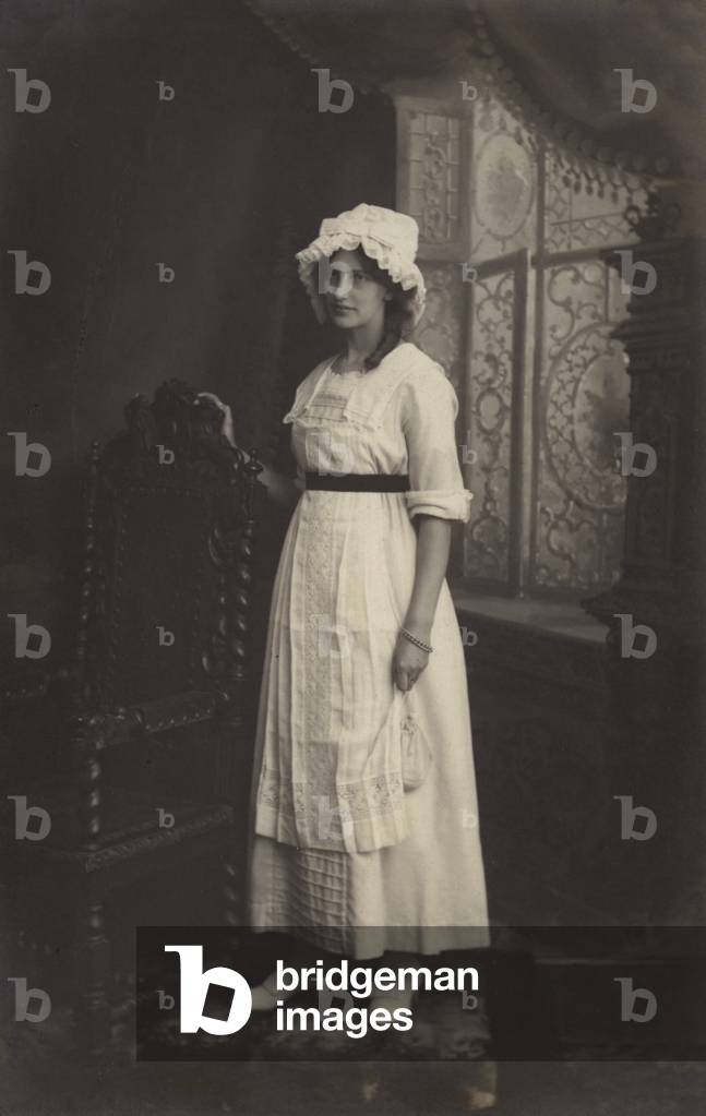 Girl in a lace cap (b/w photo)