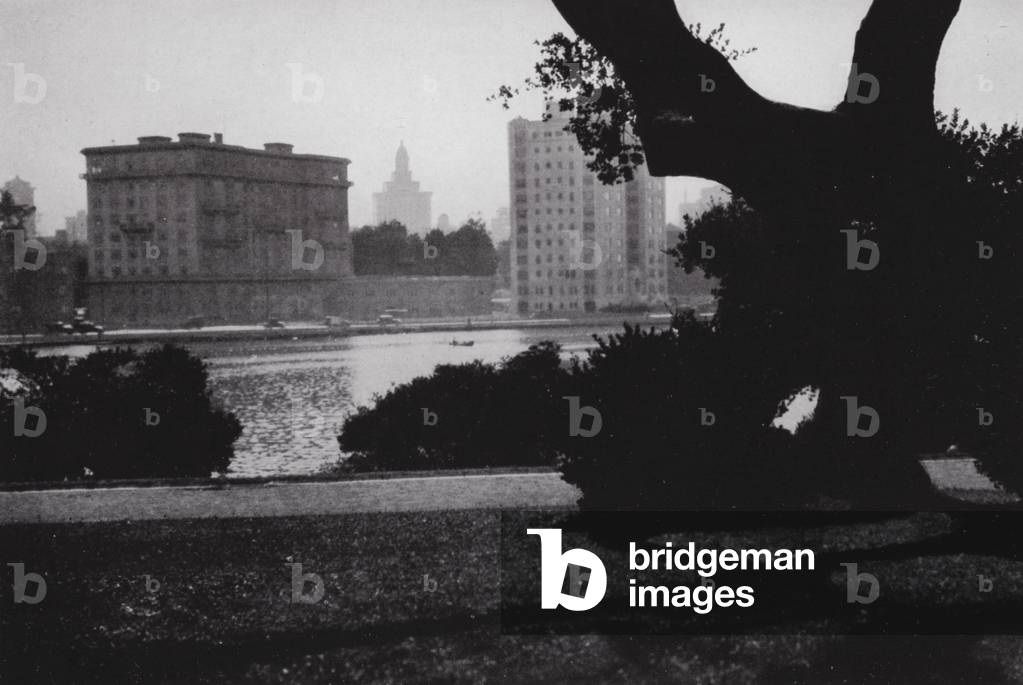 California: Oakland, Lake Merritt, in the heart of the city, surrounded by great buildings and many beautiful homes (b/w photo)