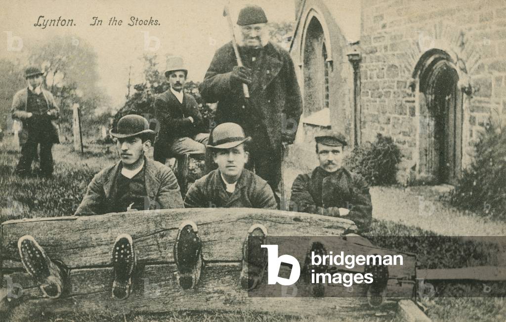 Men in the stocks at Lynton (b/w photo)