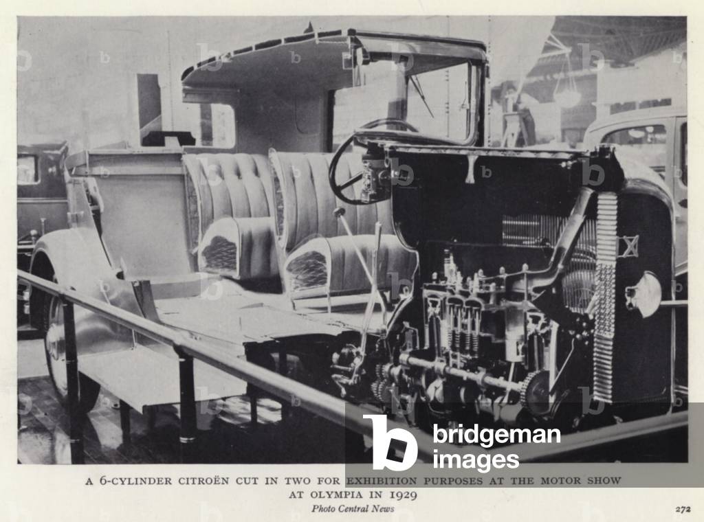 A 6-cyclinder Citroen cut in two for exhibition purposes at the Motor Show at Olympia in 1929 (b/w photo)