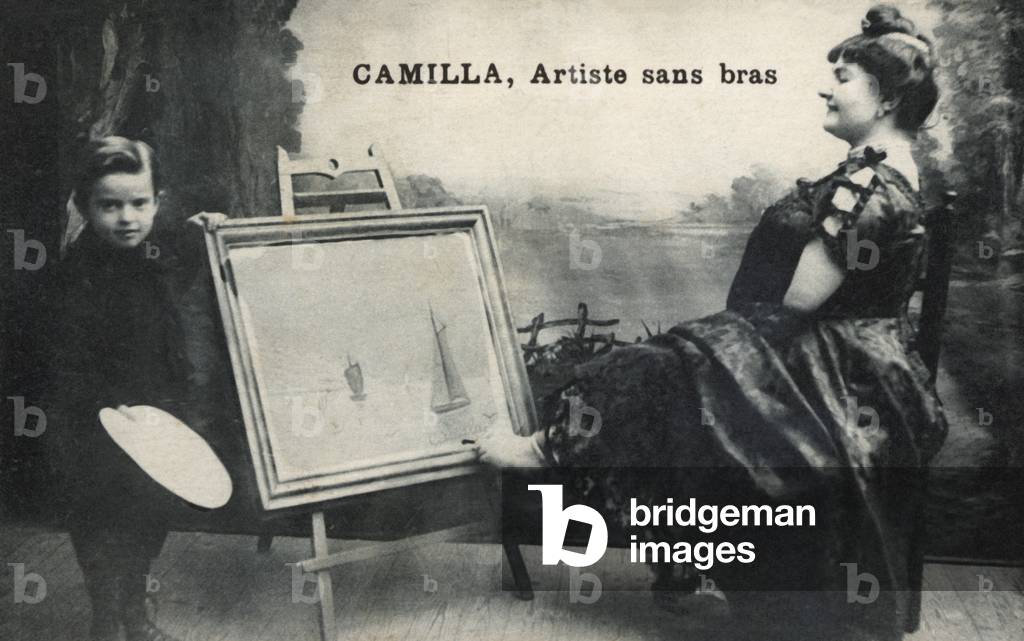 Woman painting with her feet (b/w photo)