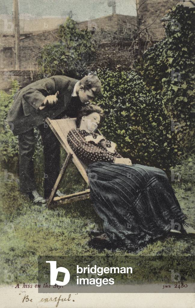 A kiss on the sly (colour photo)
