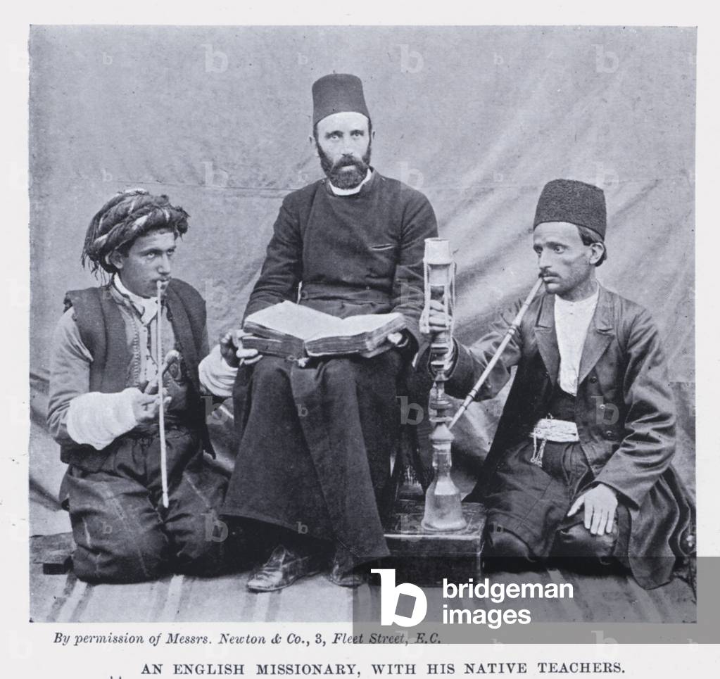 An English Missionary, with his Native Teachers (b/w photo)