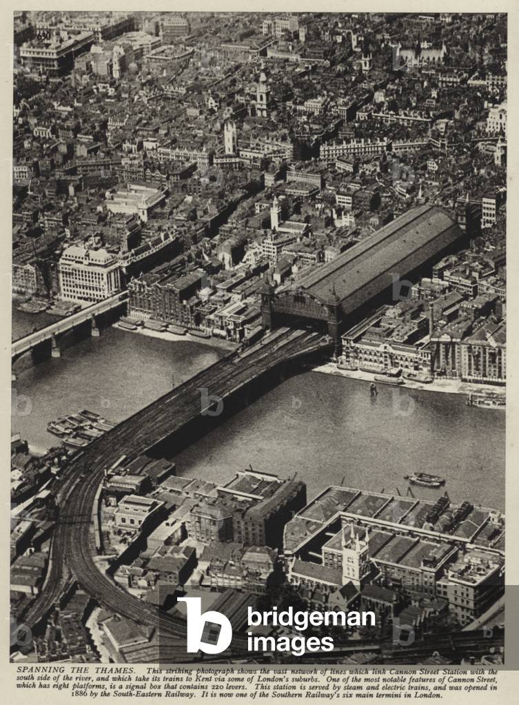 Aerial view of Cannon Street Station, terminus of the Southern Railway in the City of London (b/w photo)