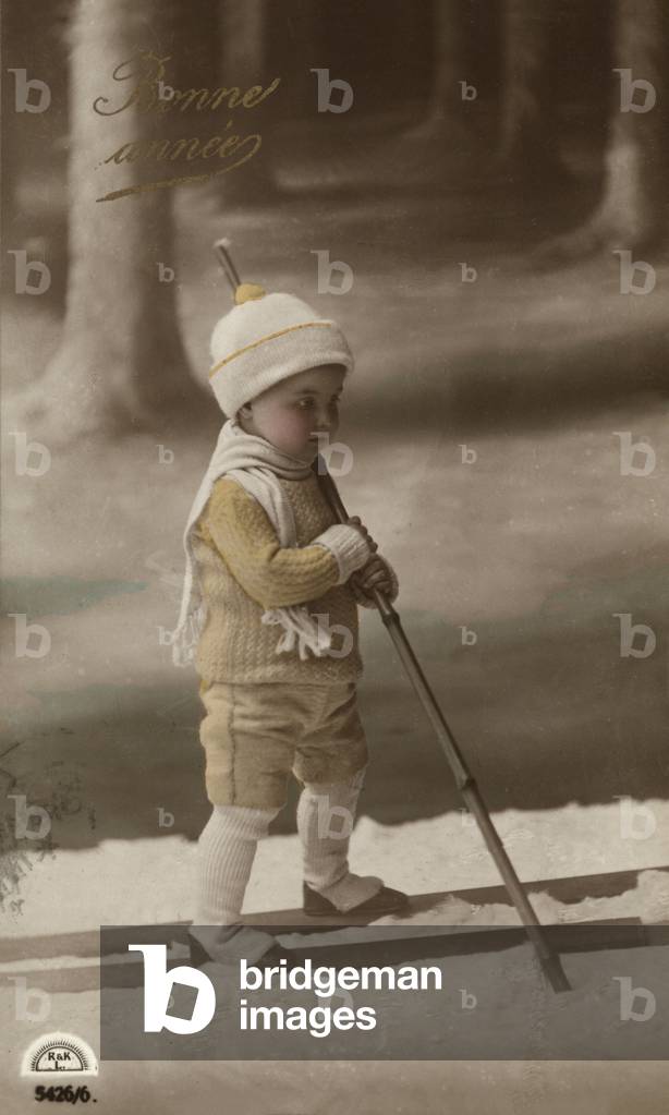 Little boy on skis (colour photo)