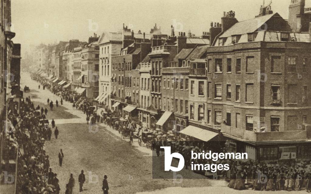 Crowds in St James's Street waiting to watch Queen Victoria pass by in the 1880s (b/w photo)