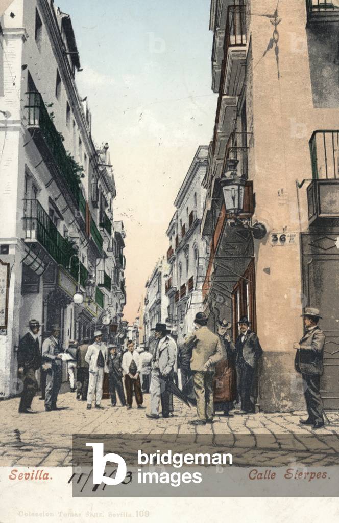 People strolling on the Calle Sierpes, Seville, Spain (photo)