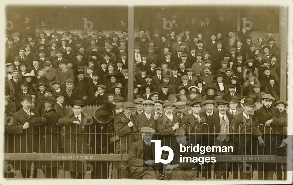 Standing on the terraces (b/w photo)