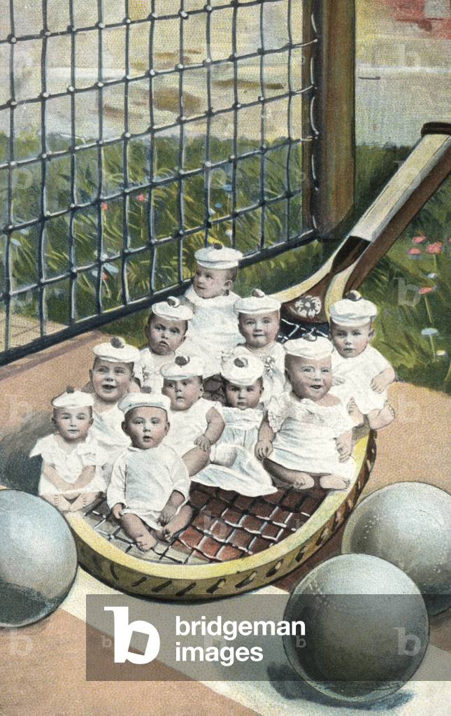 Babies on a tennis racquet (photo)
