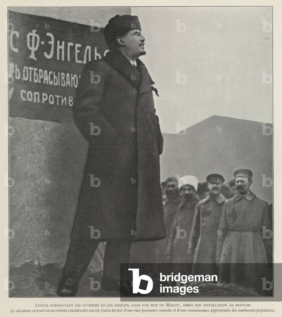 Russian Bolshevik leader Lenin addressing soldiers and workers on the streets of Moscow after securing power after the October Revolution, 1917 (b/w photo)