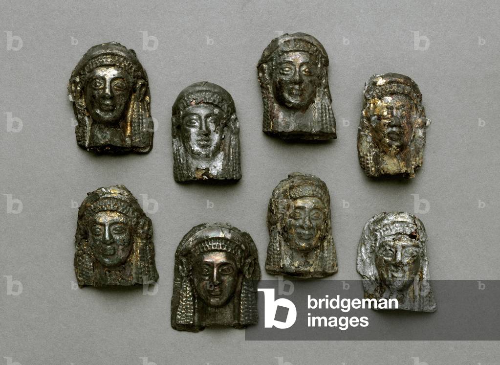 Group of eight female protomes, from of a tomb in Taranto, Italy. (gold and silver worked in regrowth)