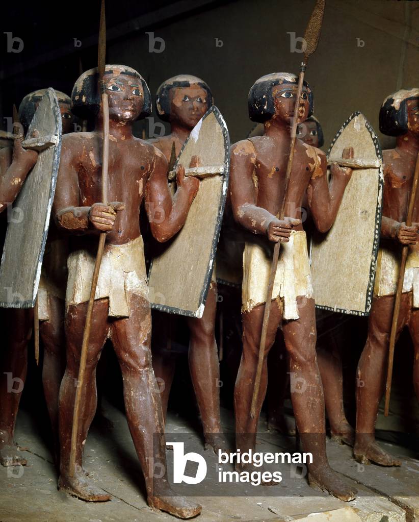 Egyptian antiquite: sculpted wooden group of Nubian archers representing the army of soldiers of Mesehti. 11th or 12th dynasty. About 2000 BC. From the tomb of Mesehti a Assiut (Assyut, Asyut). Cairo, Egyptian Museum
