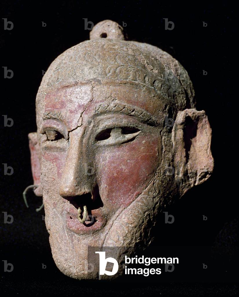 Man's mask with earrings in the nose and ears, 7th-6th century BC (terracotta)
