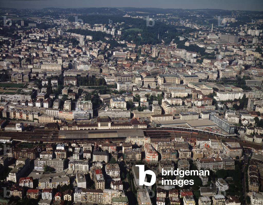 Aerial view of the city and railway station, 1990 ca - Photography