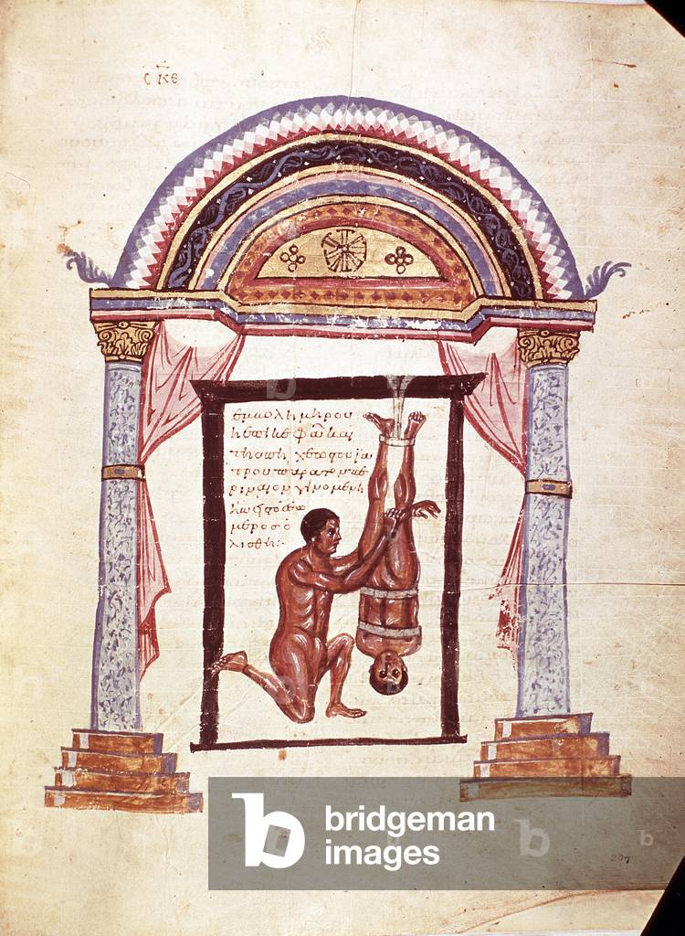 Medicine: reduction of a dislocated knee, the patient is suspended by the feet (manuscript, 10th-11th century)