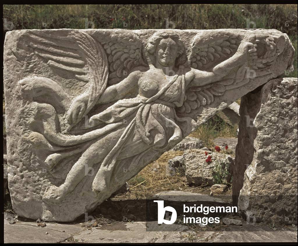 Nike. Low relief wing of the 2nd century