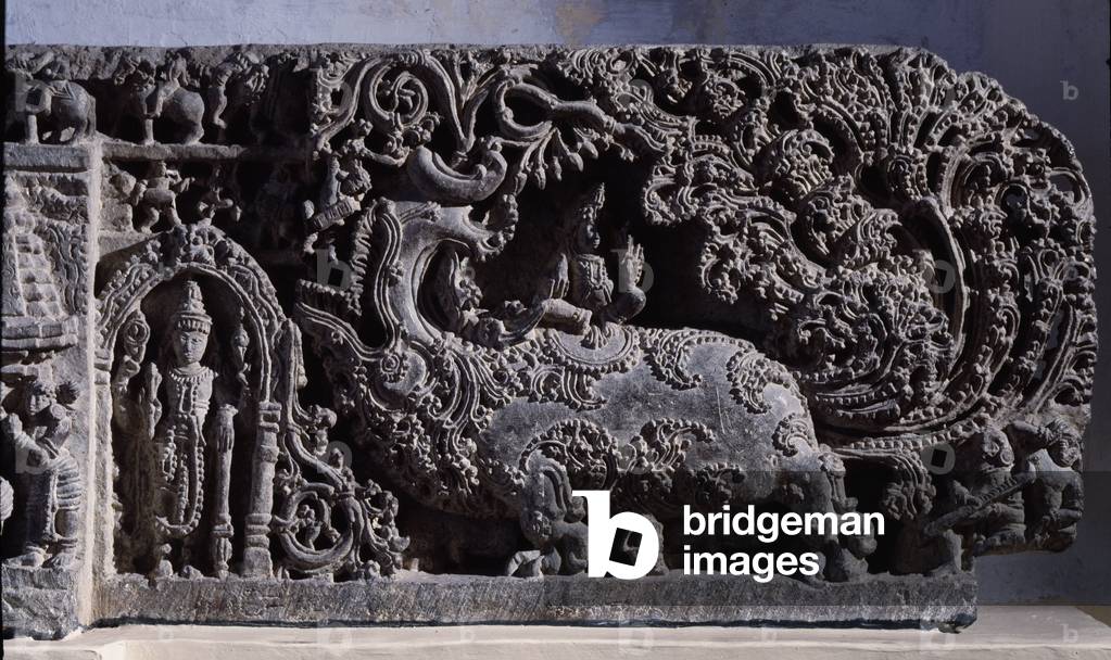 Hinduism: “” Krishna or Venugopala, master of the flute cows””” Black stone sculpture, right part (Krishna as 