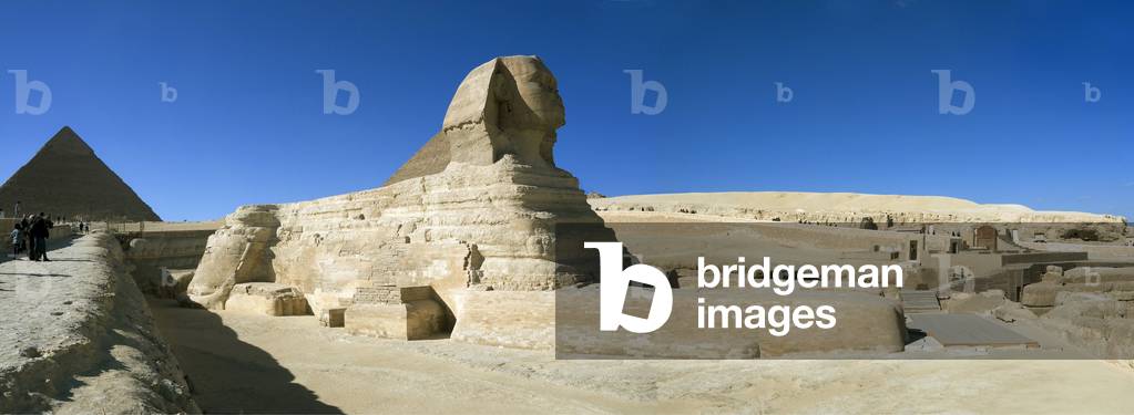 The Sphinx of Gizeh. Site of Pharaoh Chephren. On the left, the pyramid of the pharaoh. (photography)