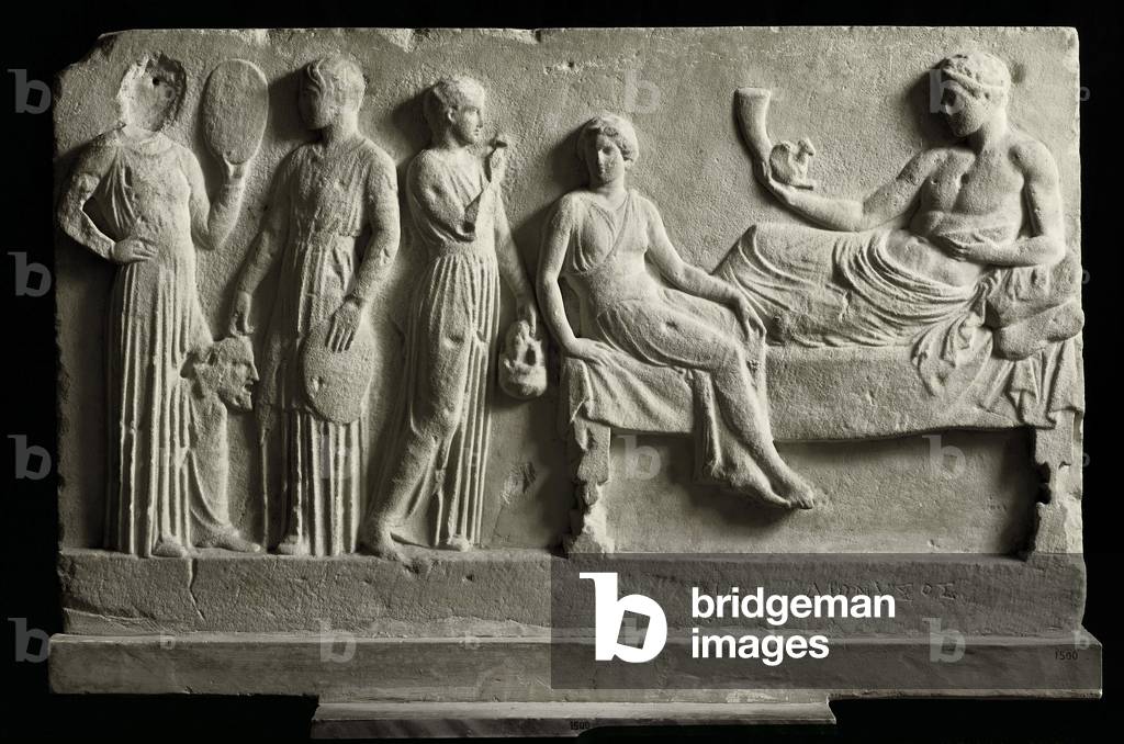 Greek art: low relief votive marble dedicated to Dionysus Bacchus by the actors, It represents “