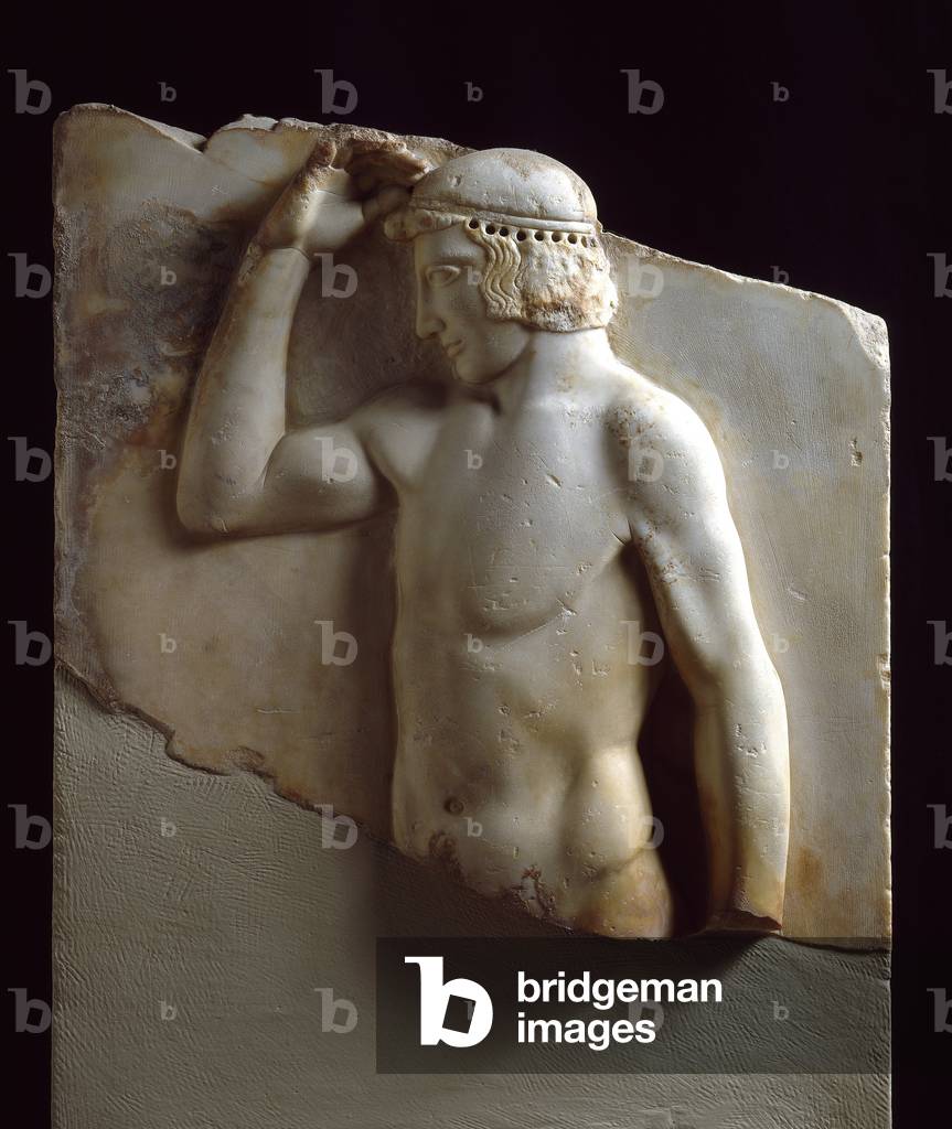 Greek antiquite: “” Autostephanoumenos or crowning athlete””, marble sculpture from the temple of Athena a Sounion, 460-450 BC - Athenes, National Archaeological Museum - Autostephanoumenos (Self-crowning athlete) - Marble votive tablet found in Sounion, near the Temple of Athena, 460-450 BC - National Archaeological Museum, Athens
