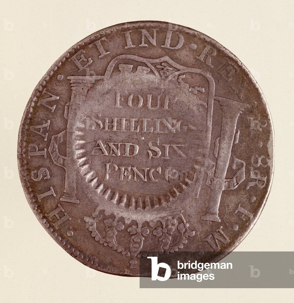 Silver coin (8 reales) from Spain: reign of Charles III (1759-1788). 1777 with countermark of 1787. Diam. 3.9 cm Naples, museo archeologico