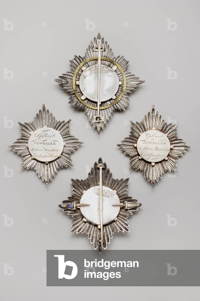 United Kingdom - Order of the Garter - Four plates (reverse): Top: Early 19th century, Silver and Emaux, H 13.1 cm; W 11,3 cm; Weight: 110 g - Left: End of 18th century-beginning XIX century, Gold and silver and enamels, H 10,3 cm; w 9,2 cm; Weight: 70 g - Right: End of 18th century-beginning XIX century, Gold and silver and enamels, H 10,5 cm; w 9,1 cm; weight 62 g - Bottom: End of XVIII-Debut XIX century, Gold and silver and enamels, D 8,7 cm; weight: 62 g - Private collection
