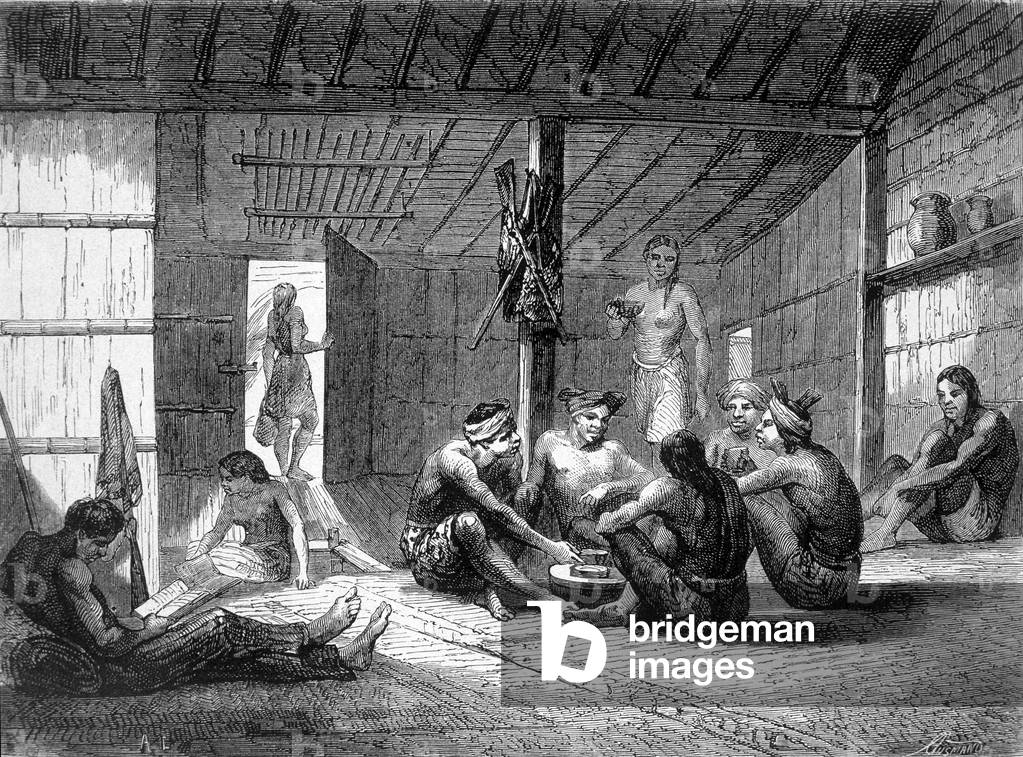 Illustration published in the 1862 edition of “Le Tour du monde” depicting the interior of a dayake house on the island of Borneo. Engraving.