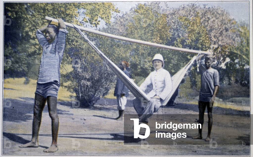 Colonial administrator on tour, carried by Africans, 1906
