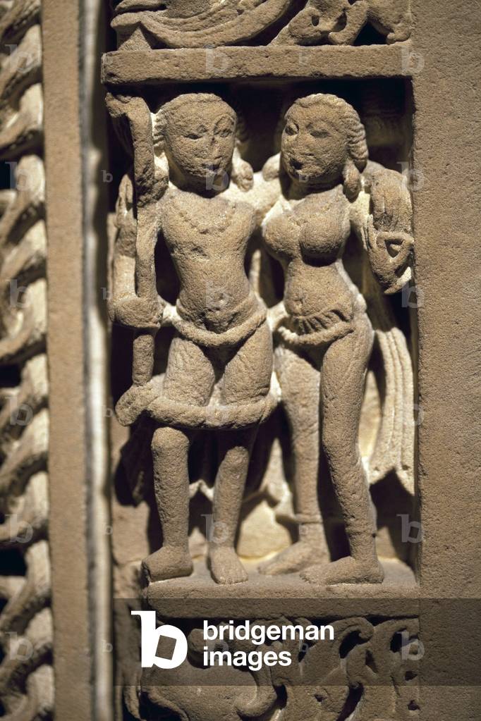 Couple of lovers. Door frame in carved stone, art of Rajasthan or Uttar Pradesh (India), 9th-10th century. National Museum of Korea, Seoul (South Korea).