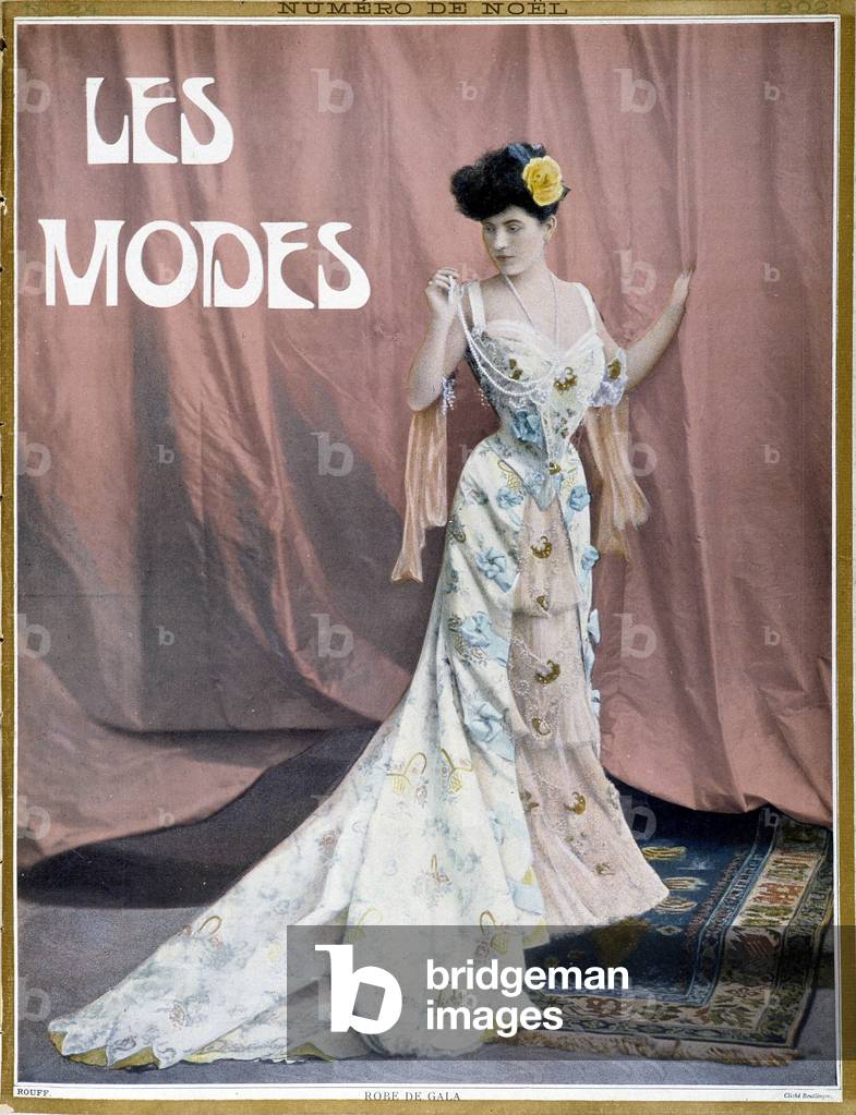 Woman wearing a gala dress from the beginning of the century - cover in 