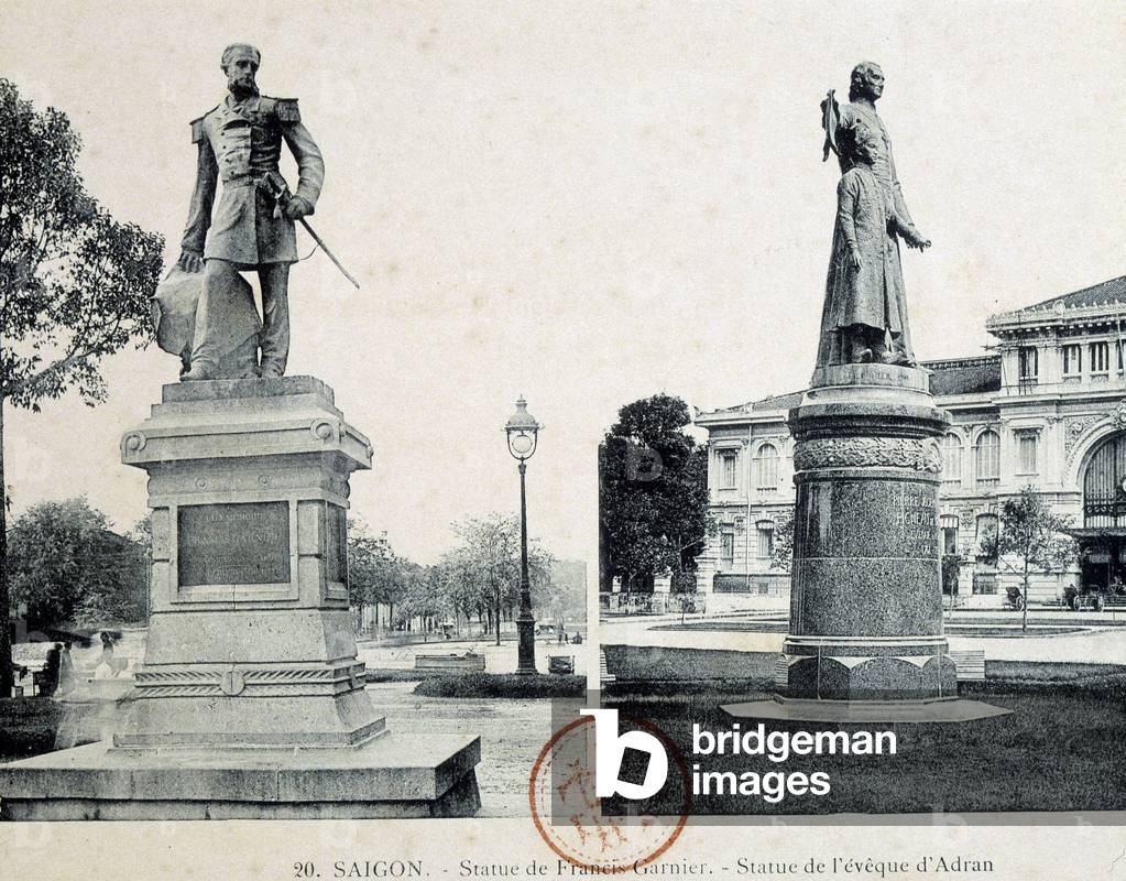 Statue of Rigault of Genouilly and of the eveque of Adran in Saigon, “” Saigon and its surroundings””, by Dieulefils, c. 1900.