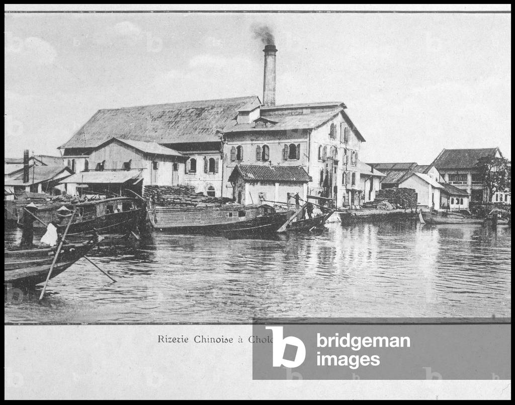 Chinese rice factory in Cholon, “” Souvenir de la Cochinchine et du Cambodia”, Crespin, c. 1924.