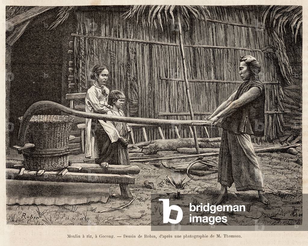 The rice mill, in front of a farmer's house in Gocong, engraving after a drawing by Robin illustrating the voyage to Cochinchine, by Doctor Morice, in 1872, published in “” Le tour du monde””” 1875, edited by Edouard Charton, Hachette edition, Paris. Selva Collection.